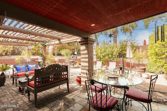 view of patio / terrace featuring outdoor dining area, outdoor lounge area, and a pergola