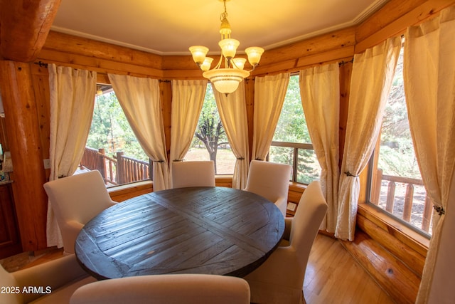 6168 W Hidden Pines Loop, Pine, AZ 85544 - dining area with a chandelier, healthy amount of natural light, and light wood-type flooring