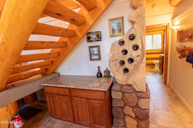 6168 W Hidden Pines Loop, Pine, AZ 85544 - bar area with log walls and stairs