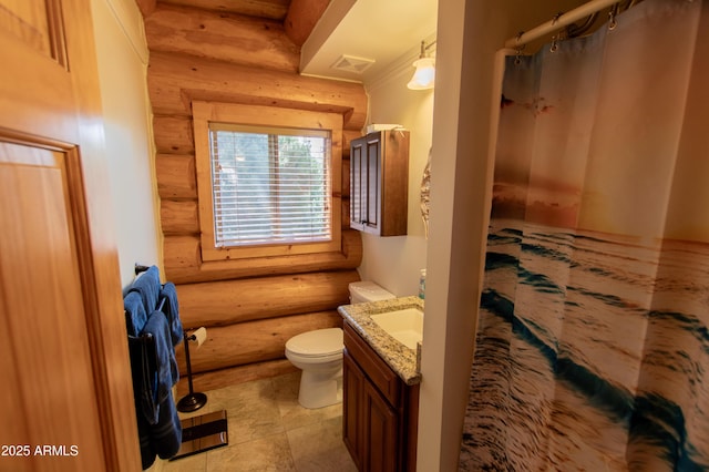 6168 W Hidden Pines Loop, Pine, AZ 85544 - full bath featuring rustic walls, vanity, toilet, curtained shower, and tile patterned floors