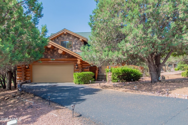 6168 W Hidden Pines Loop, Pine, AZ 85544 - log-style house with log siding, asphalt driveway, and stone siding