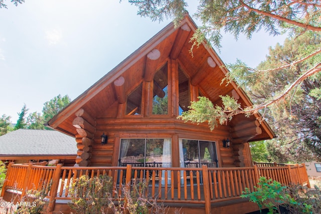 6168 W Hidden Pines Loop, Pine, AZ 85544 - view of side of home with log exterior and a deck