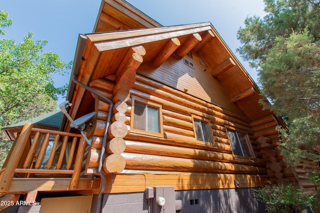 6168 W Hidden Pines Loop, Pine, AZ 85544 - view of home's exterior with log siding and crawl space