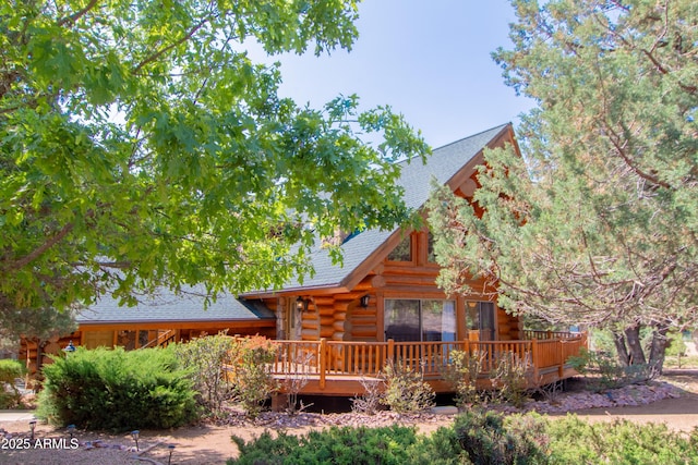 6168 W Hidden Pines Loop, Pine, AZ 85544 - log-style house featuring log exterior, a deck, and roof with shingles