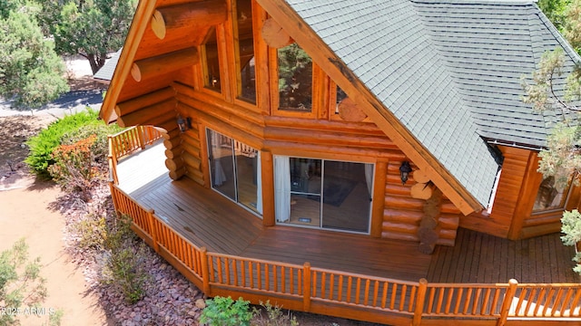 6168 W Hidden Pines Loop, Pine, AZ 85544 - back of property with log exterior, a wooden deck, and a shingled roof
