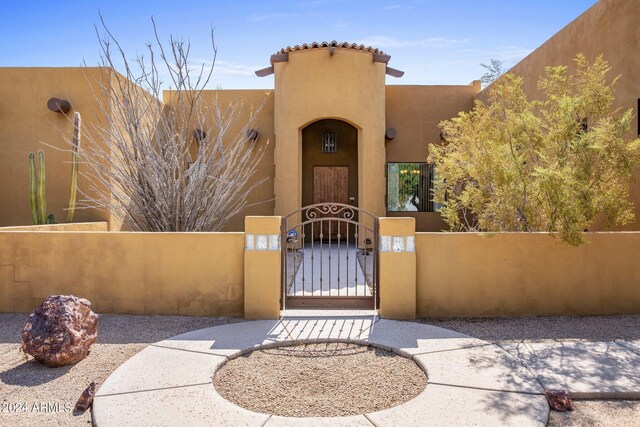 view of pueblo revival-style home