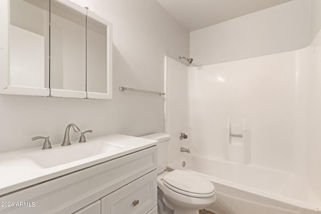 full bathroom with vanity, bathing tub / shower combination, and toilet