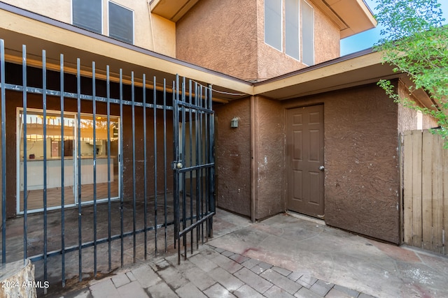 property entrance with a patio