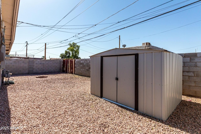 1113 E 5th St, Casa Grande, AZ 85122 - view of shed with a fenced backyard