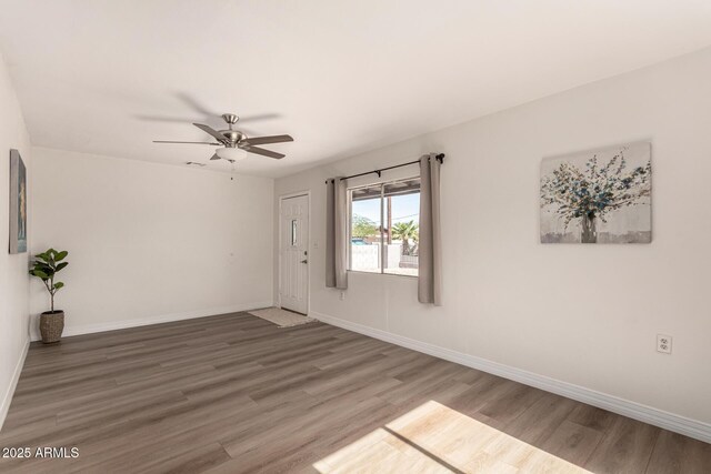 1113 E 5th St, Casa Grande, AZ 85122 - spare room with wood finished floors and ceiling fan