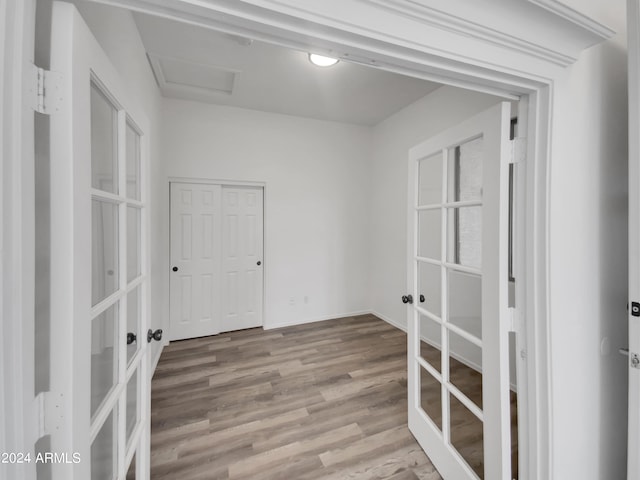 interior space featuring hardwood / wood-style flooring and french doors