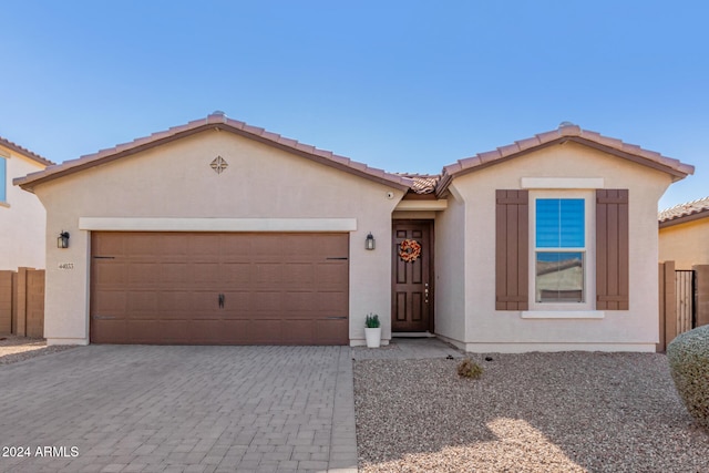 view of front of property featuring a garage