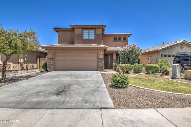 prairie-style home featuring a garage, stone siding, concrete driveway, and stucco siding