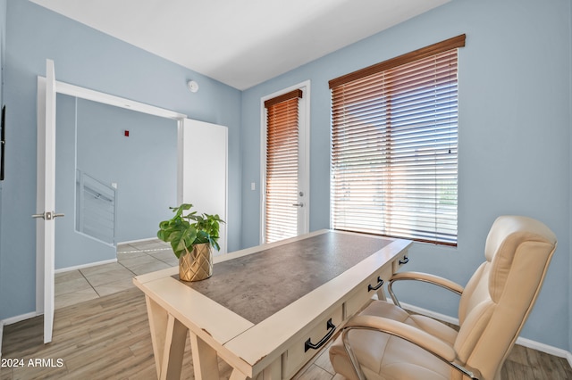 office area featuring light hardwood / wood-style floors