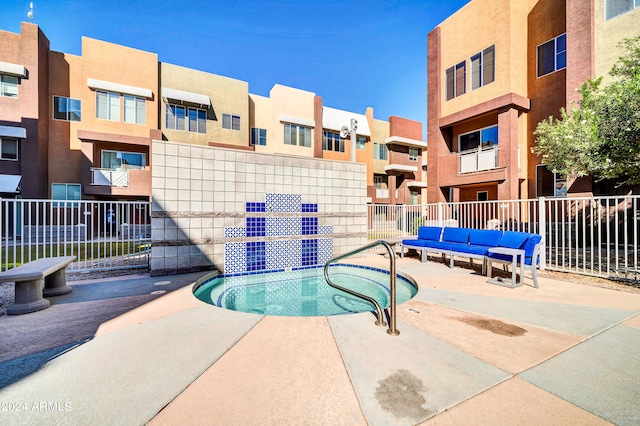 view of swimming pool with an outdoor hangout area