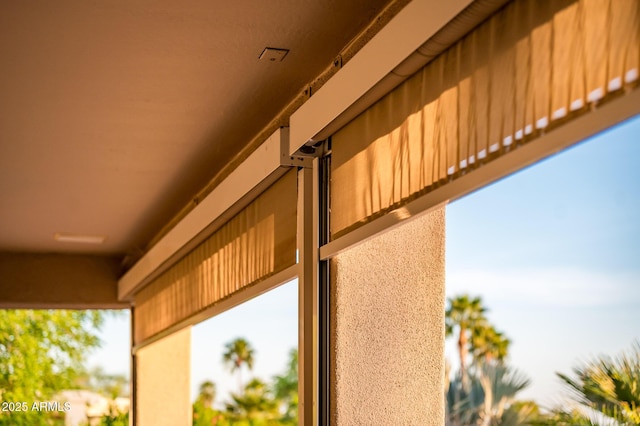 exterior details featuring stucco siding