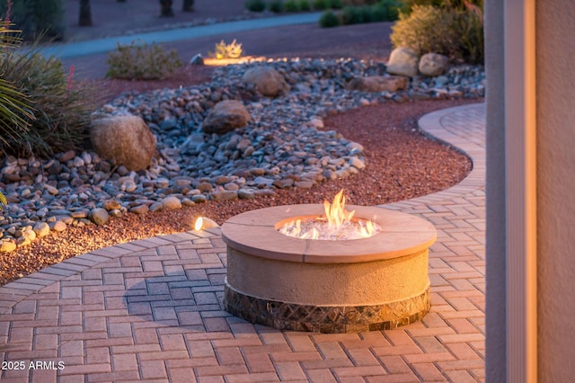 exterior space with an outdoor fire pit