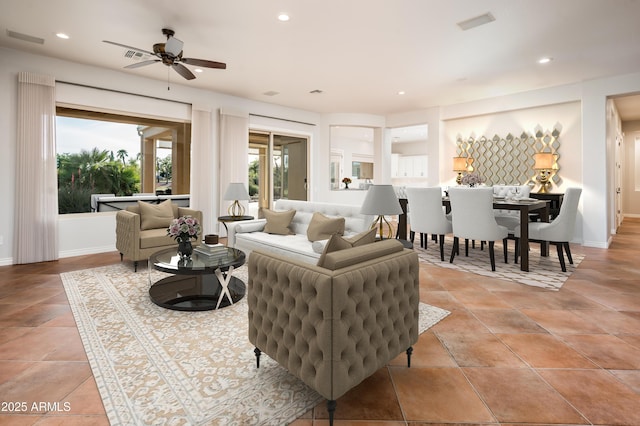 living area featuring visible vents, recessed lighting, baseboards, and ceiling fan