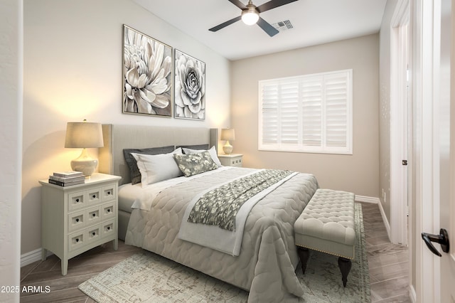 bedroom with visible vents, baseboards, ceiling fan, and wood finished floors