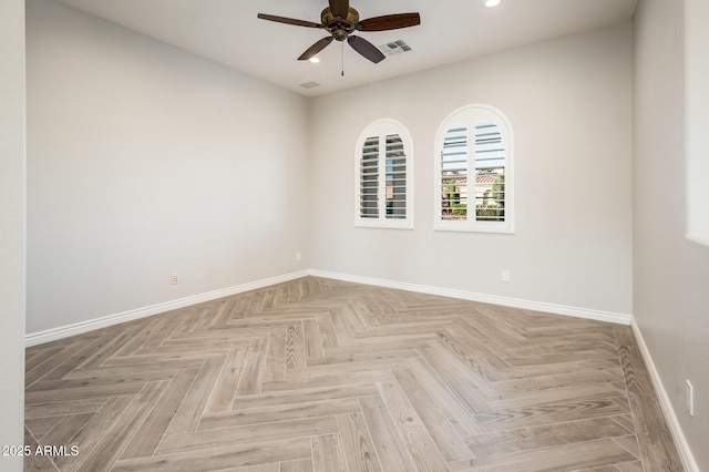 unfurnished room featuring recessed lighting, ceiling fan, visible vents, and baseboards