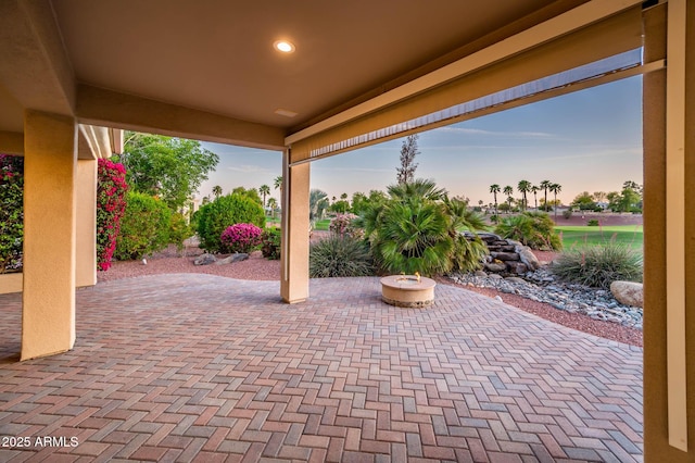 view of patio terrace at dusk