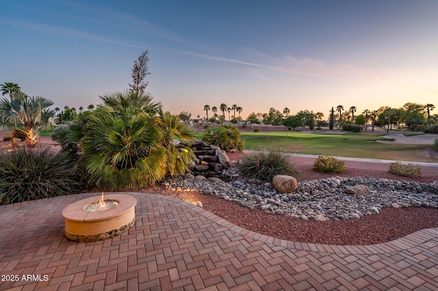 view of patio terrace at dusk