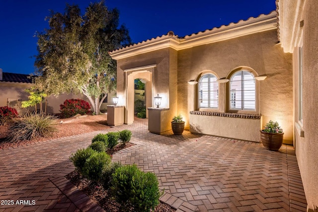 view of patio at night