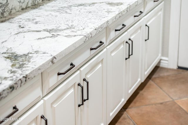 details featuring white cabinets