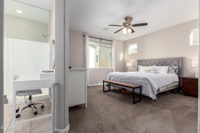 bedroom with ceiling fan and carpet floors