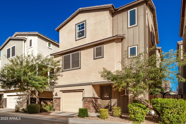 multi unit property featuring a garage