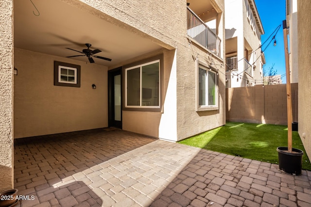 view of patio with ceiling fan