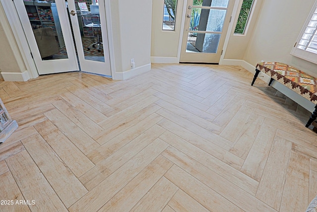 interior space featuring baseboards