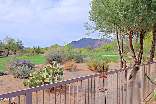 view of mountain feature featuring view of golf course
