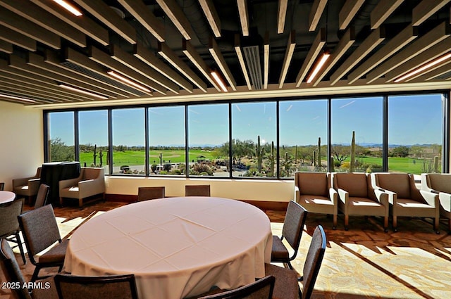 dining room featuring golf course view