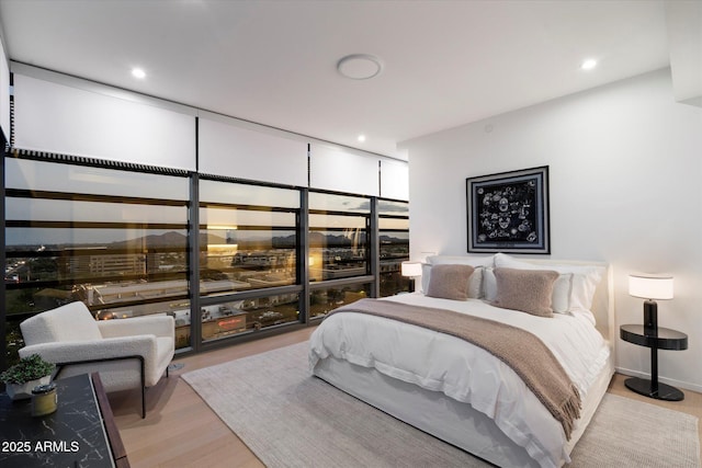 7180 E Kierland Blvd Unit 1116, Scottsdale, AZ 85254 - bedroom featuring wood finished floors and recessed lighting