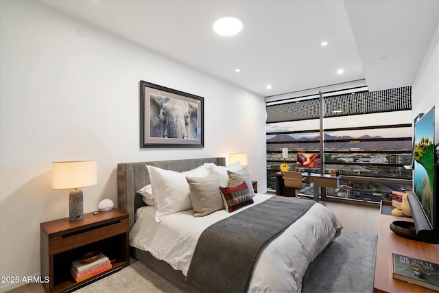 7180 E Kierland Blvd Unit 1116, Scottsdale, AZ 85254 - bedroom featuring recessed lighting and wood finished floors