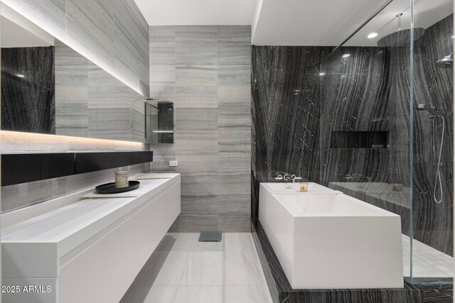 7180 E Kierland Blvd Unit 1116, Scottsdale, AZ 85254 - full bathroom with tile walls, vanity, a marble finish shower, a bathtub, and recessed lighting