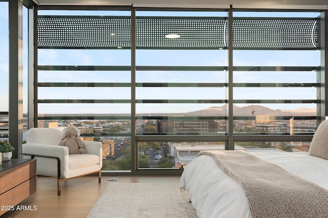 7180 E Kierland Blvd Unit 1116, Scottsdale, AZ 85254 - bedroom featuring wood finished floors