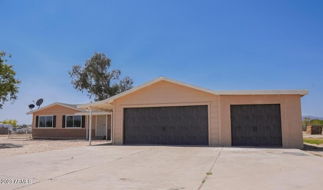 ranch-style home with a garage