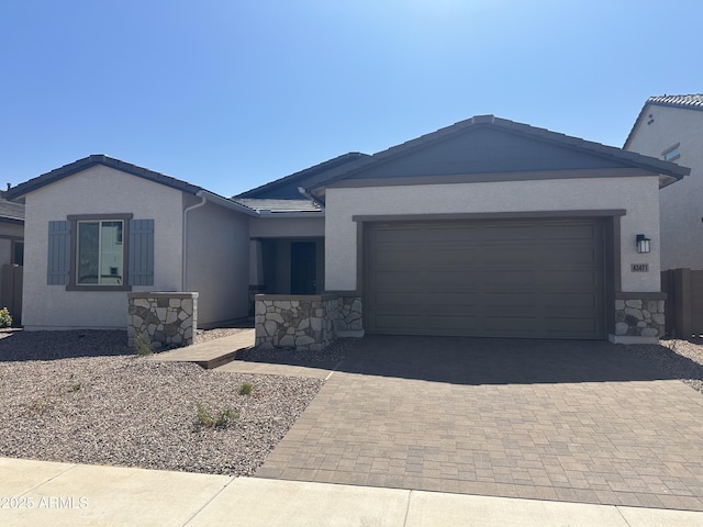43471 N Wollemi St, Queen Creek, AZ 85140 - single story home featuring decorative driveway, stone siding, a garage, and stucco siding