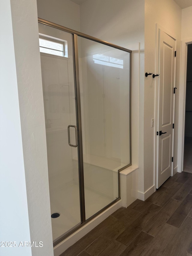 43471 N Wollemi St, Queen Creek, AZ 85140 - full bathroom with a shower stall, wood finished floors, and baseboards