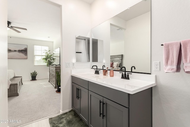 bathroom with vanity and ceiling fan