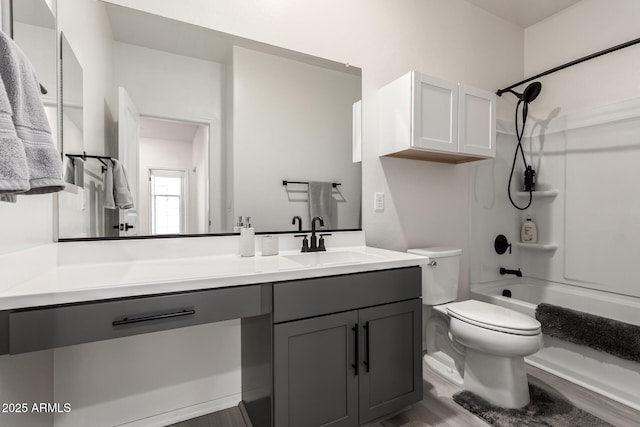 full bathroom with shower / tub combination, vanity, toilet, and wood-type flooring