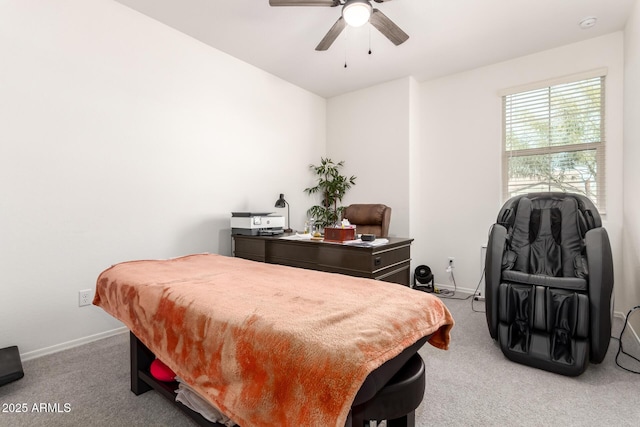 bedroom with light carpet and ceiling fan