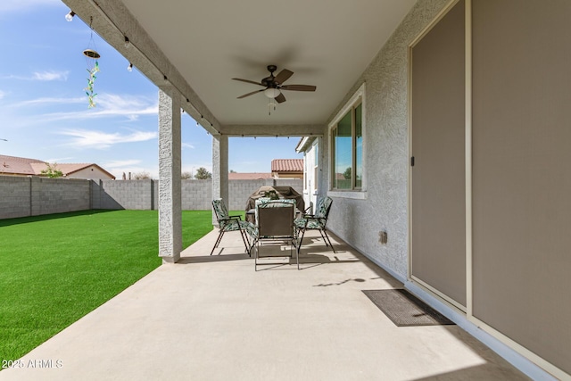 view of patio / terrace with ceiling fan