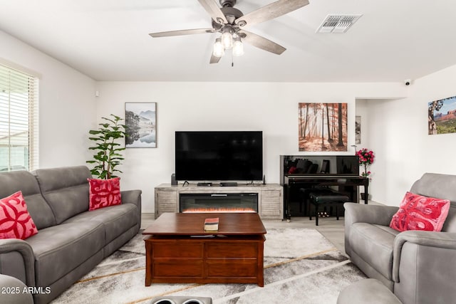 living room with ceiling fan