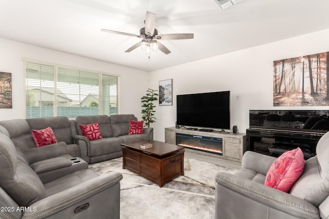 living room featuring ceiling fan