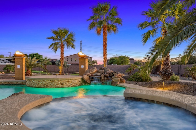 view of swimming pool featuring pool water feature