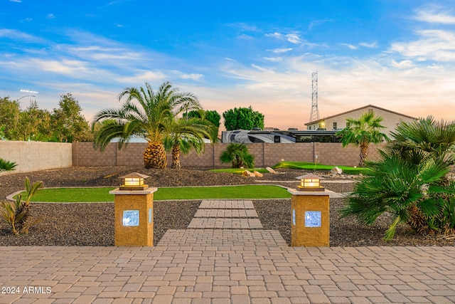 view of patio terrace at dusk