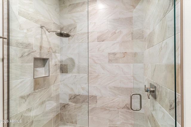 bathroom featuring an enclosed shower